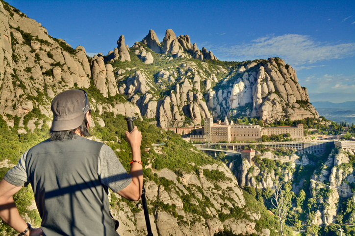 Hiker Enjoys the Mountainview Above the Abbey of Montserrat