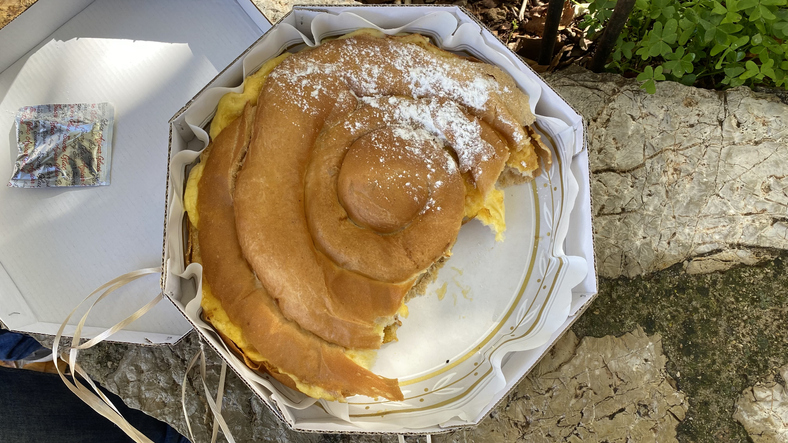 A bitten traditional ensaïmada of Mallorca