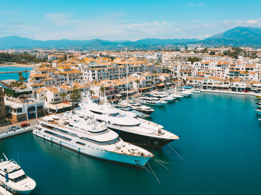 Aerial top view of luxury yachts in Puerto Banus marina, Marbella, Spain.